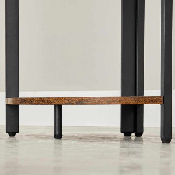 Bottom section of Scandinavian corner bookcase with sturdy black steel legs and rustic wooden shelf