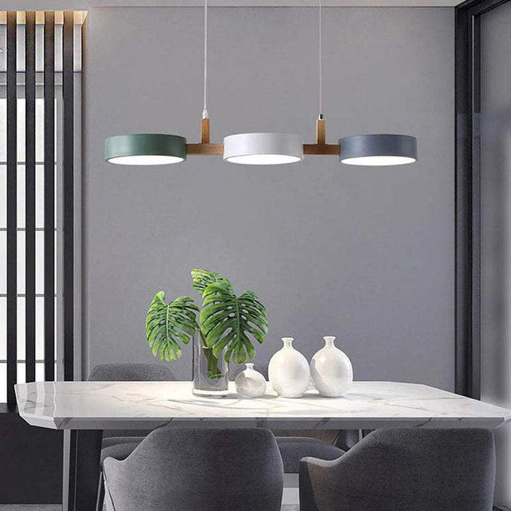 Scandinavian dining room pendant light in grey, white, and green with clean design.