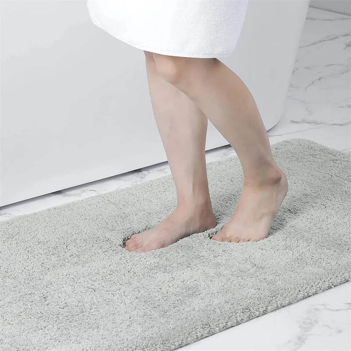 Long light grey non-slip bathroom mat perfect for stepping out of the bath
