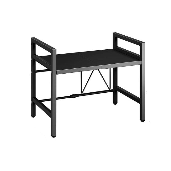 Black metal adjustable microwave shelf organiser desk on a white background
