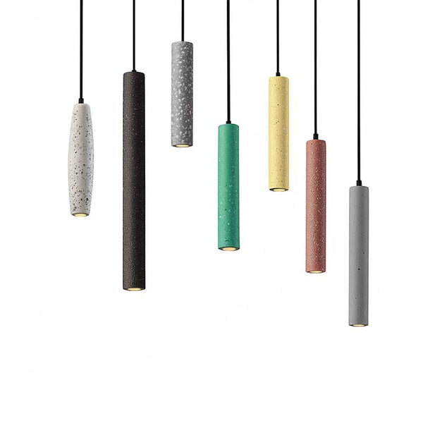 Set of colorful cylindrical pendant lights on a white background