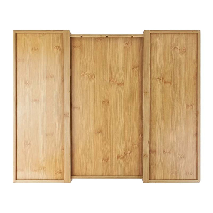 Three wooden cutting boards of different sizes on a white background