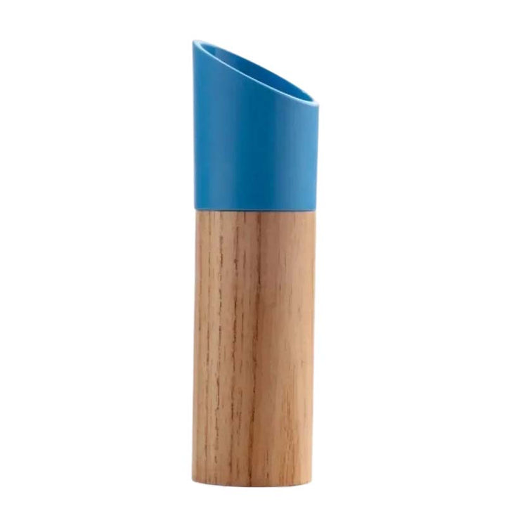 Beech wood kitchen grinder with the blue grinding part on a white background