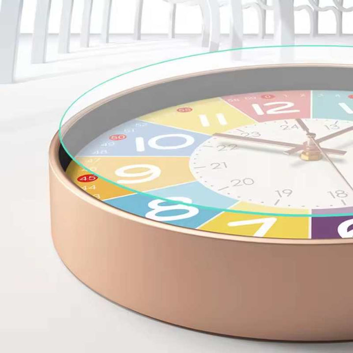 Close-up of colourful silent kids wall clock with glass cover and Scandinavian design