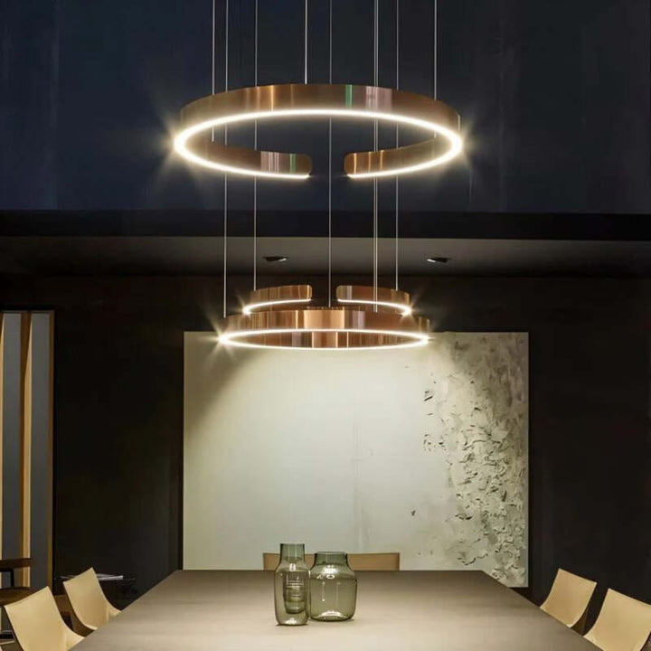 Triple gold circular LED chandeliers – modern Nordic ceiling lighting for dining area