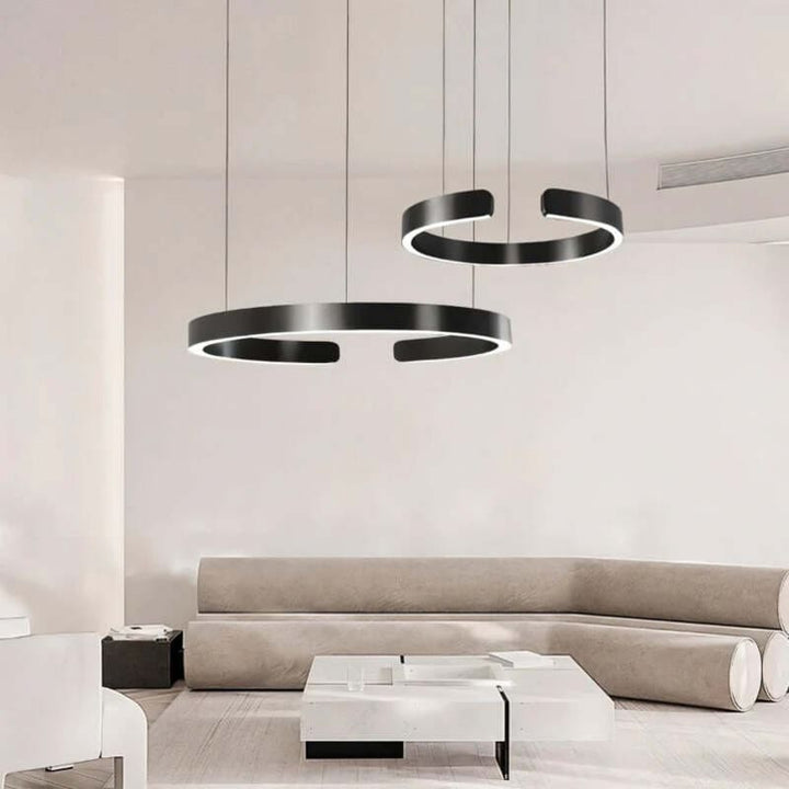 Pair of black circular LED chandeliers – minimalist modern Nordic ceiling lighting