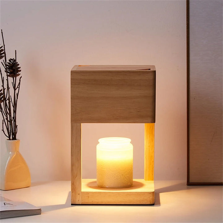 Natural wood square candle warmer lamp on dining table, Scandinavian minimalist style