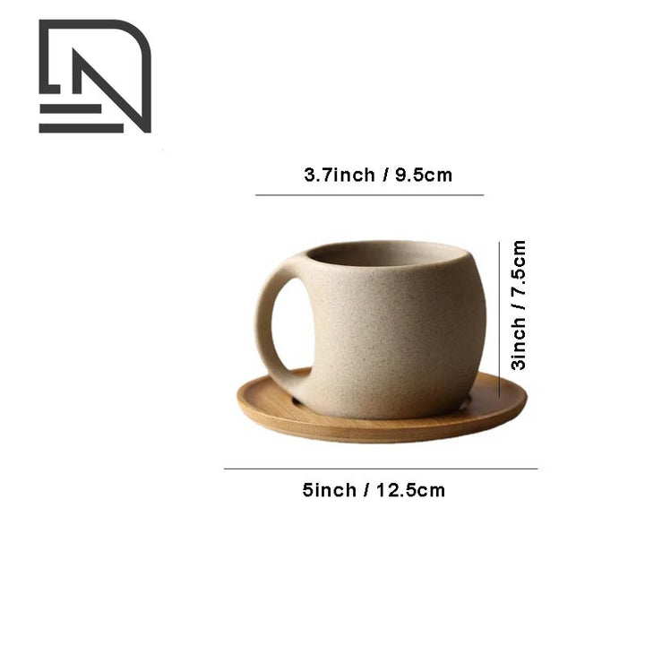 Unglazed ceramic mug with a smooth matte finish, paired with a natural acacia wood saucer with dimensions on the white background.