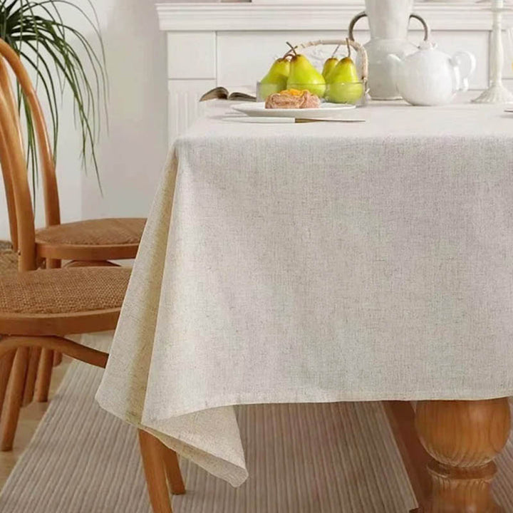 Minimalist cotton tablecloth on compact wooden dining table, ideal for natural home aesthetics