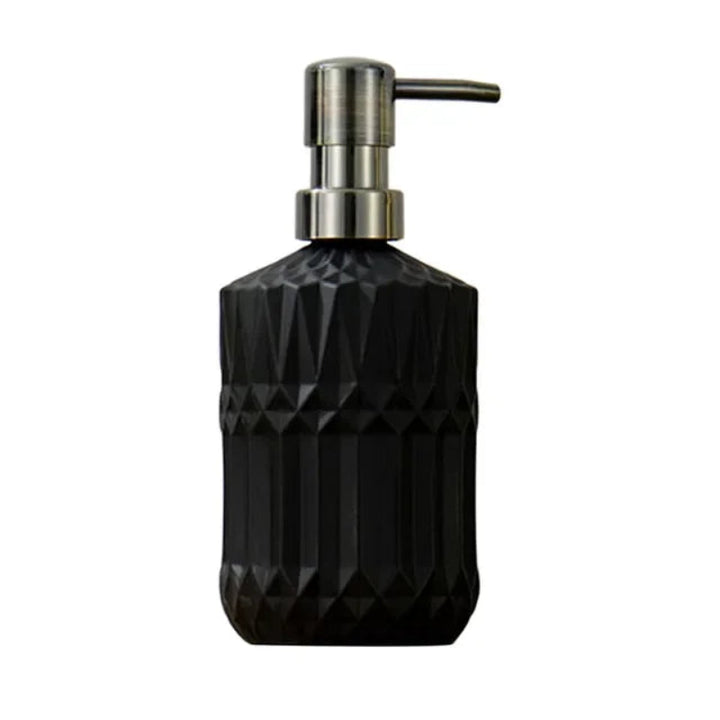 Black diamond-patterned soap dispenser with metallic pump on a white background