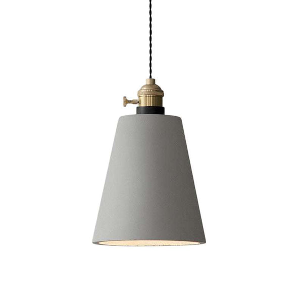 Minimalist grey concrete pendant light with brass fitting and black braided cord, Nordic modern design