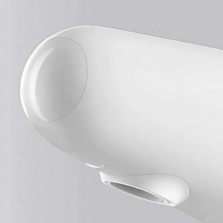 Smooth matte white LED lamp head with adjustable tilt, modern design for task or mood lighting.
