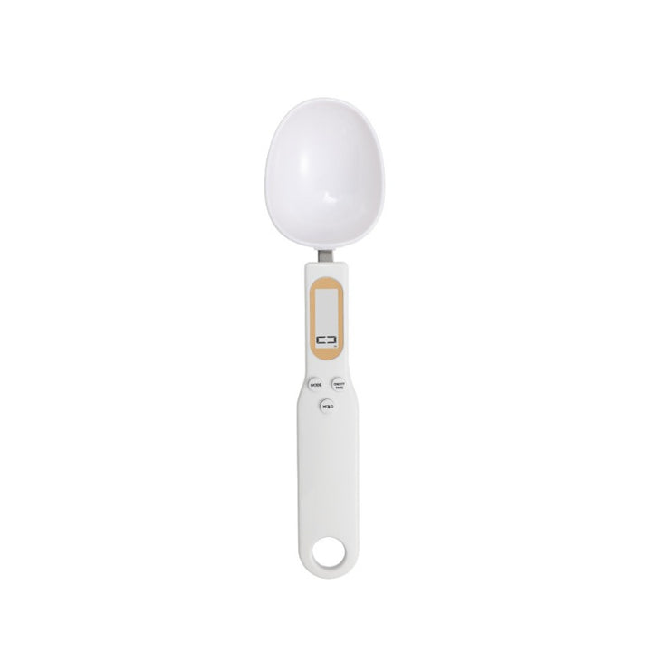 White measuring spoon with digital display on a white background