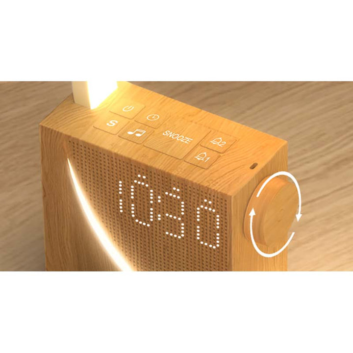 Wooden digital clock with LED display on a wooden surface