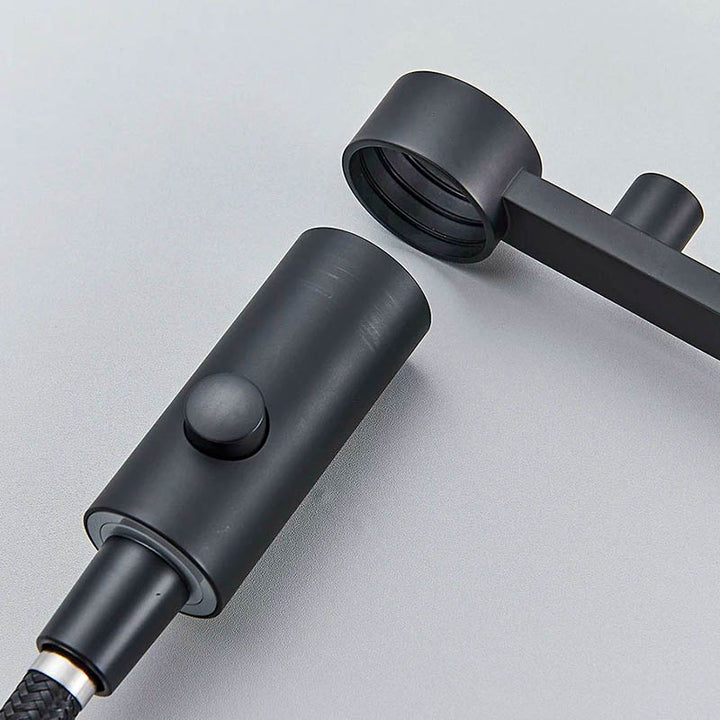 Close-up of black matte pull-out spray head for kitchen tap with button control and easy attachment fitting for flexible cleaning