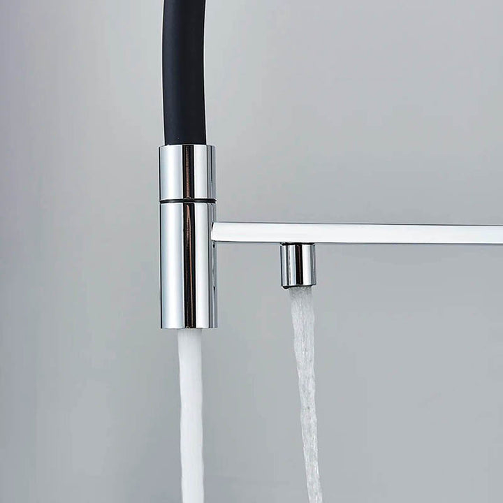 Side view of dual-stream kitchen tap in polished chrome showing split outlets for hot/cold water and purified filtered water