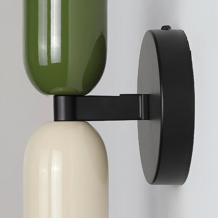 Side view of mounted Nordic LED wall lamp with two rotating heads, suitable for bedside or hallway lighting