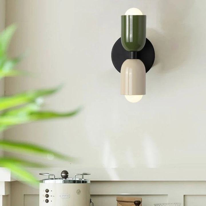 Scandinavian LED wall light in green and white above desk space, minimalist dual-head sconce lighting 