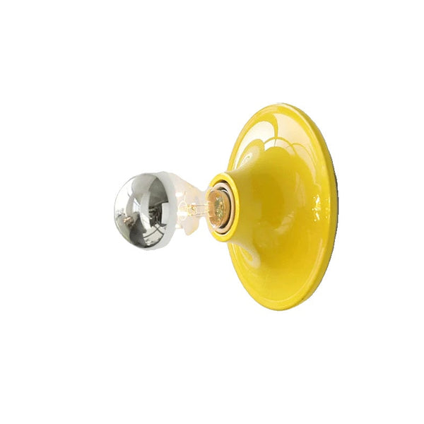 FYR modern LED wall light in glossy yellow finish with exposed bulb Scandinavian design