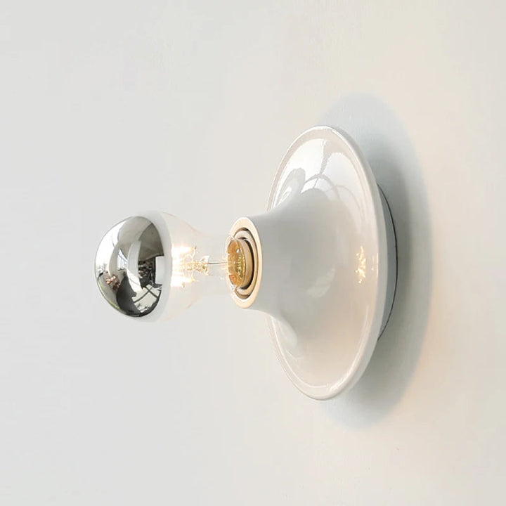 FYR Scandinavian LED wall light in glossy white ceramic finish with decorative bulb