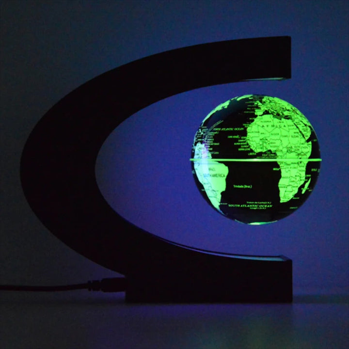 Levitating globe with LED lighting against a dark background
