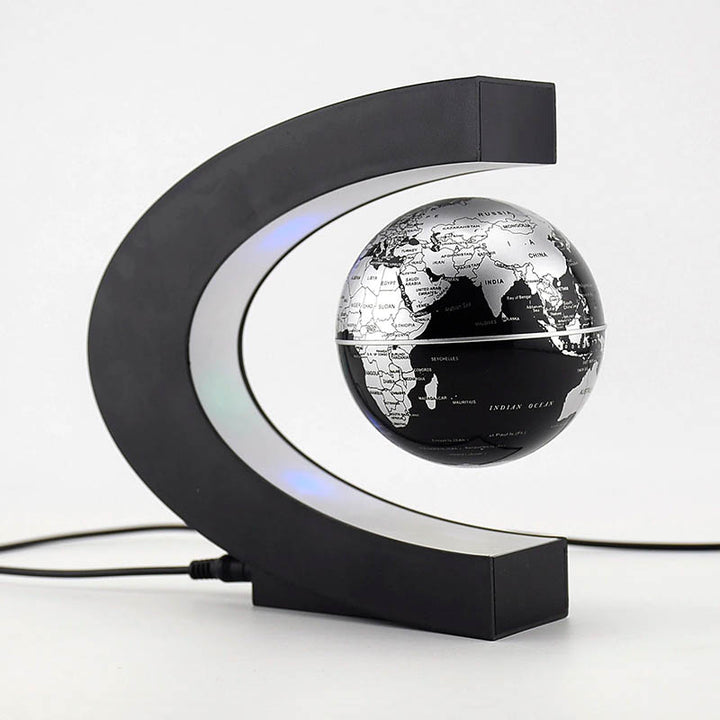 Black magnetic levitation globe lamp with silver world map and LED lighting, floating night light for home office decoration