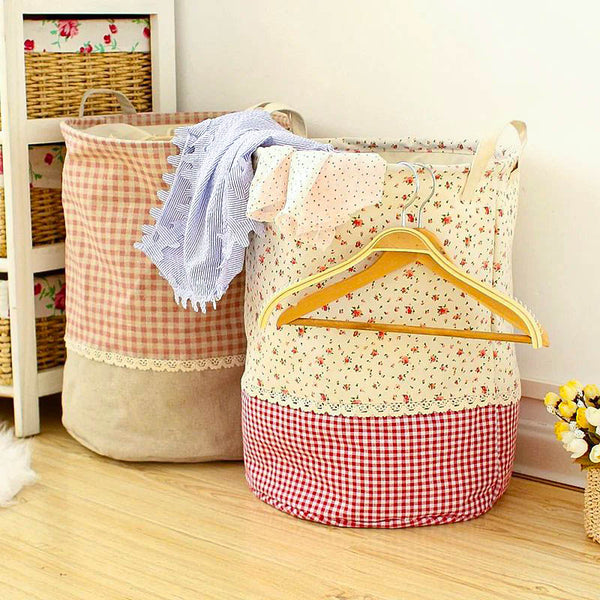 Vintage Nordic cotton laundry basket in floral print with red gingham base, ideal for bedroom or nursery storage.