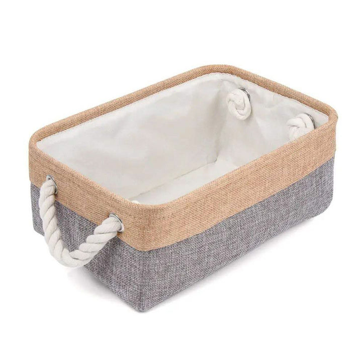 Rectangular storage basket with beige top and gray bottom on a white background