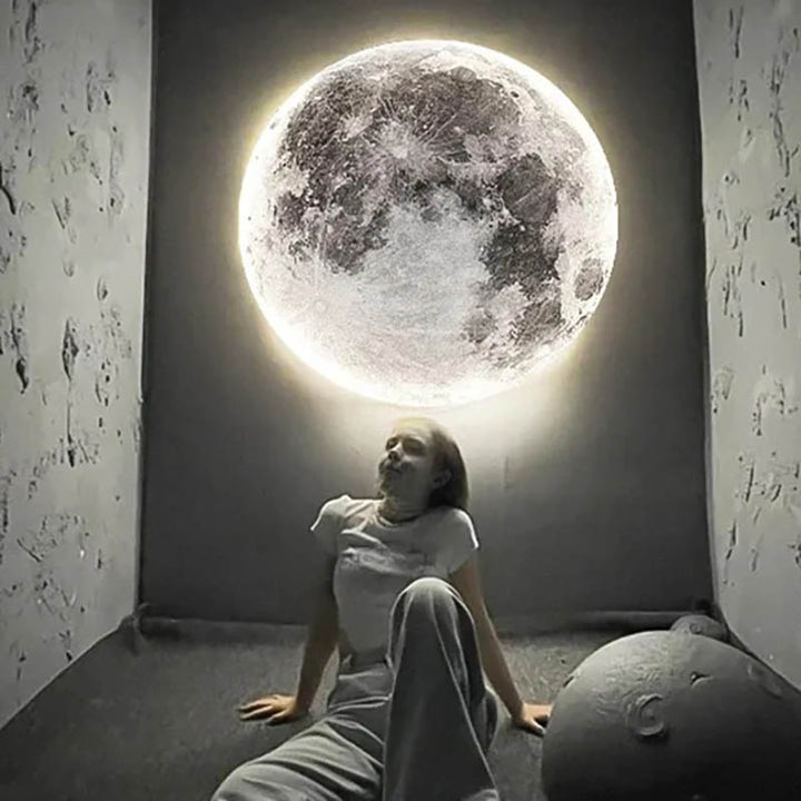 Moon-themed GAIA 3D LED wall lamp in soft white glow, atmospheric lighting with modern design, bedroom feature light.