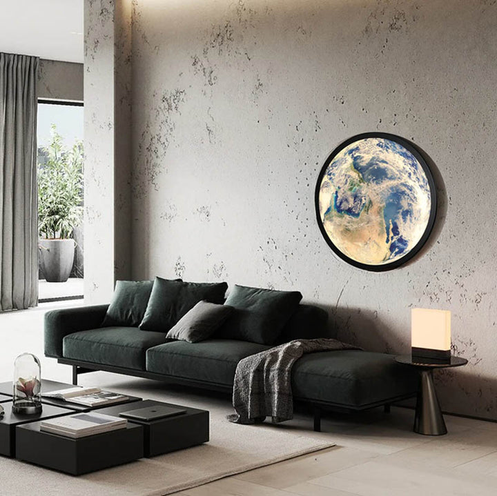 GAIA 3D dimmable LED earth wall lamp by Nordic Essentials, large size, warm glow in modern living room setting