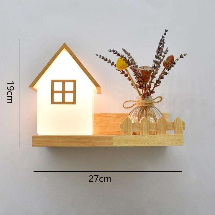 Wooden LED wall lamp with house-shaped light, decorative shelf and fence detail, 27x19cm