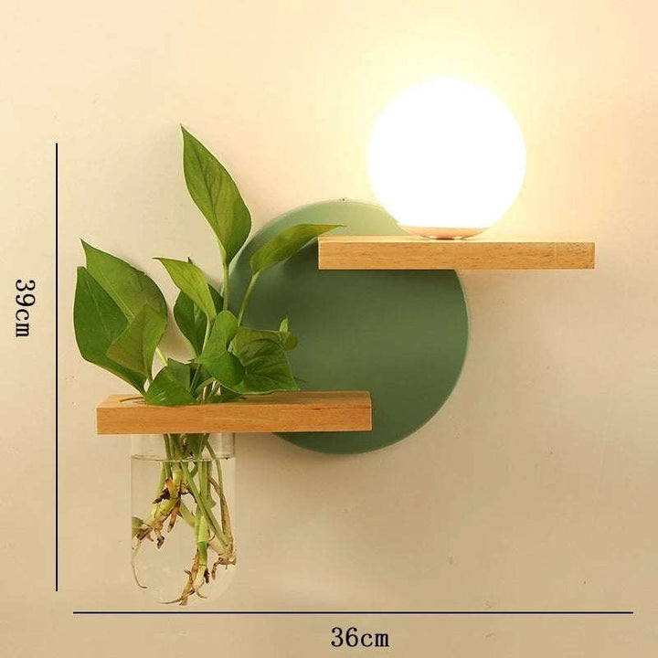 Nordic wooden LED wall lamp with globe light, green circular backplate and planter holder, 39x36cm