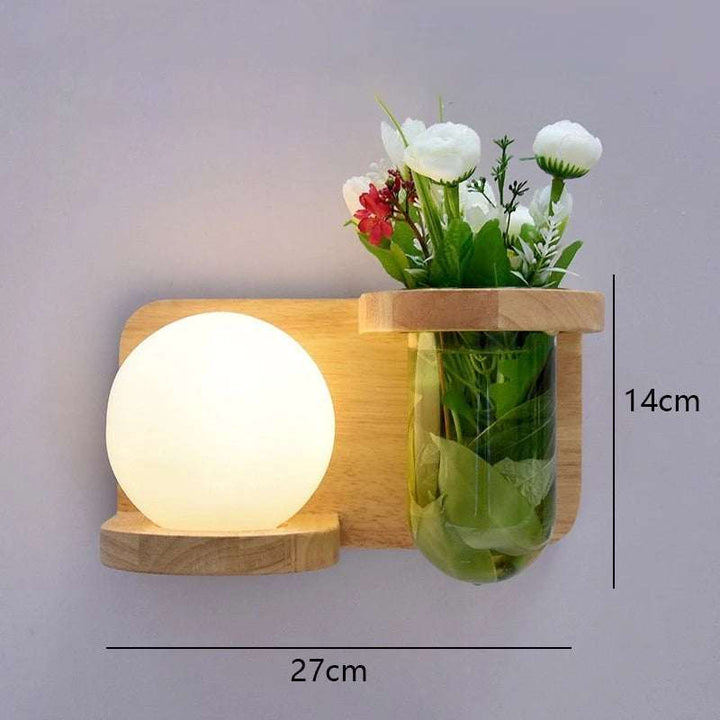 Wooden LED wall sconce with globe light and glass planter holder, 27x14cm, natural wood finish