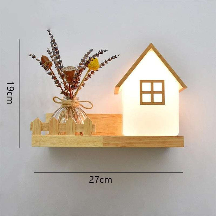 Wooden LED wall lamp with house-shaped light and shelf, 27x19cm, Scandinavian style.