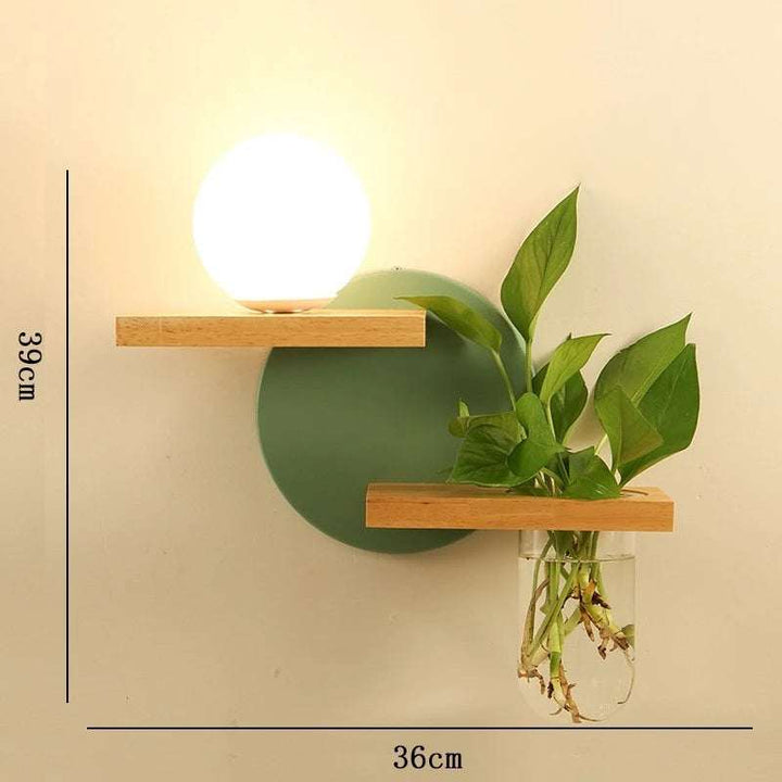 Wooden wall sconce with globe LED light, circular green backplate, and planter holder, 39x36cm