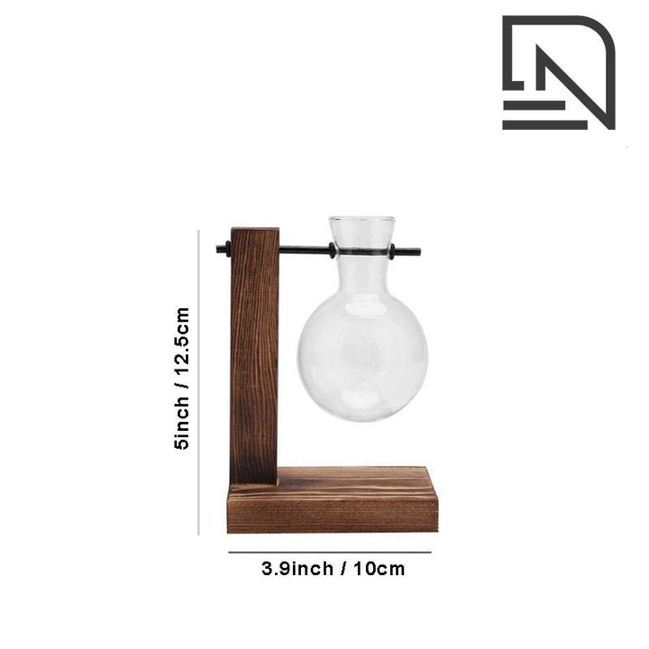 Single bulb glass vase on L-shaped dark wood stand, 12.5cm tall, ideal for hydroponic plant display.