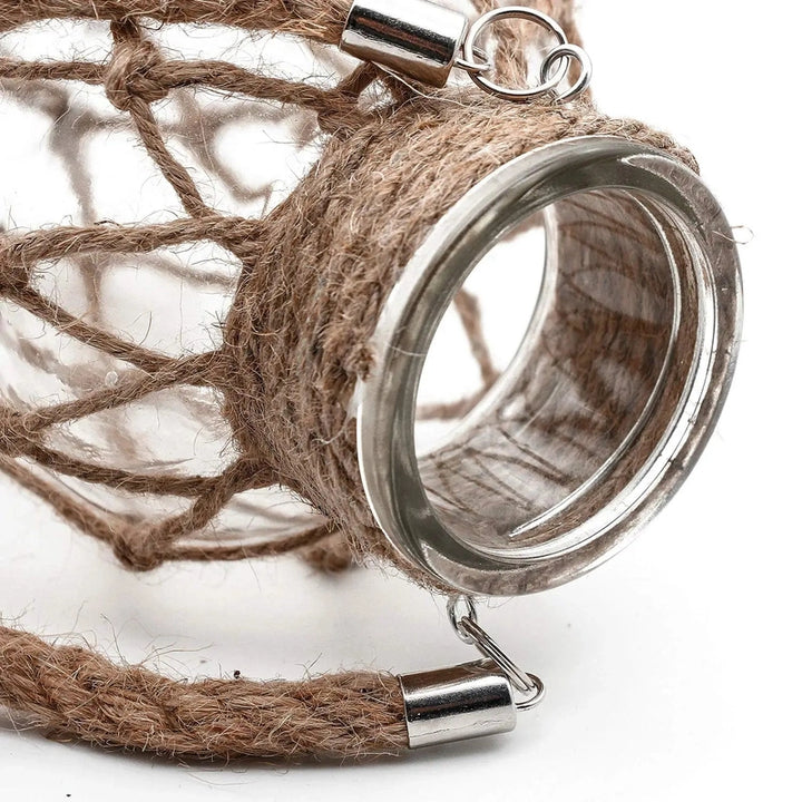Close-up of a rope with metal clasp on a white background