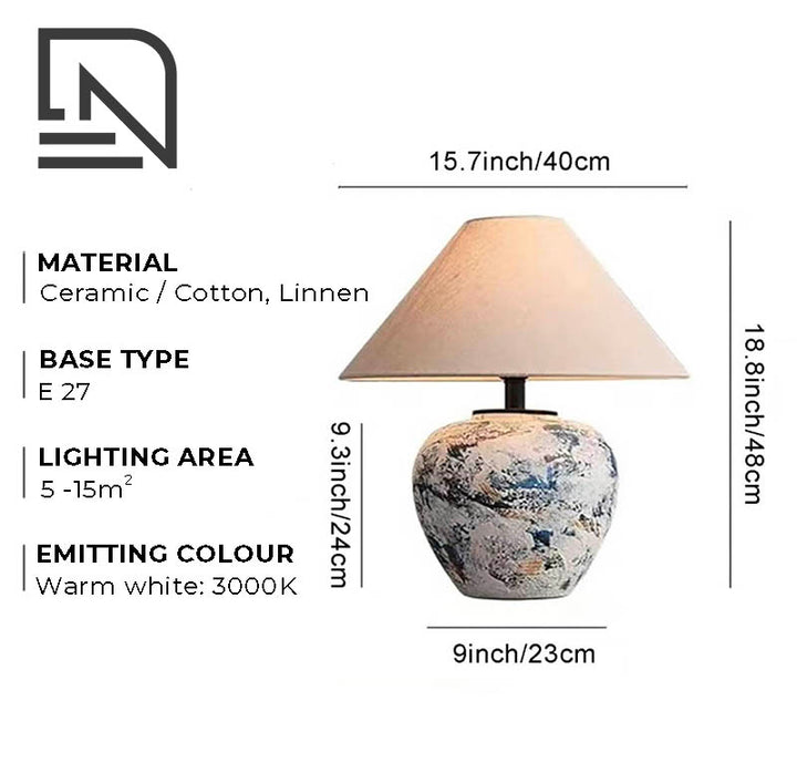 HANDLAVET ceramic handcrafted table lamp with a cotton fabric shade, featuring a modern Nordic design for warm ambient lighting.