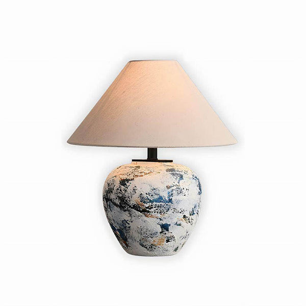 HANDLAVET ceramic handcrafted table lamp with a cotton fabric shade, featuring a modern Nordic design for warm ambient lighting.