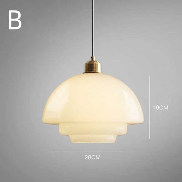 Cream glass pendant light with dome shade, 28cm wide and 19cm high, brass fitting, mid-century Scandinavian style
