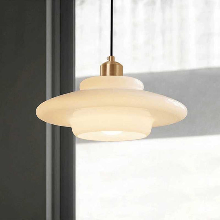 Cream glass pendant light with brass holder, mid-century Scandinavian style for modern interiors