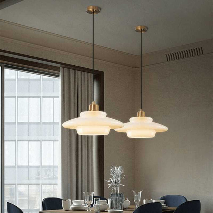 Cream glass pendant light hanging in wooden dining room, Nordic minimalist kitchen lighting