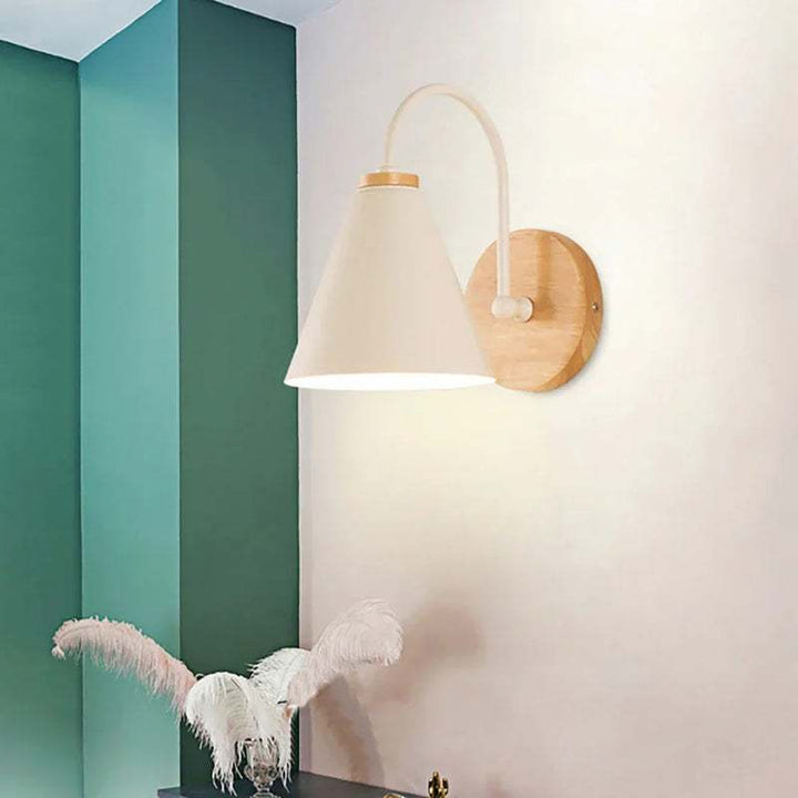 White HYGGE Scandinavian LED wall lamp with wood mount and cone shade for modern hallway lighting