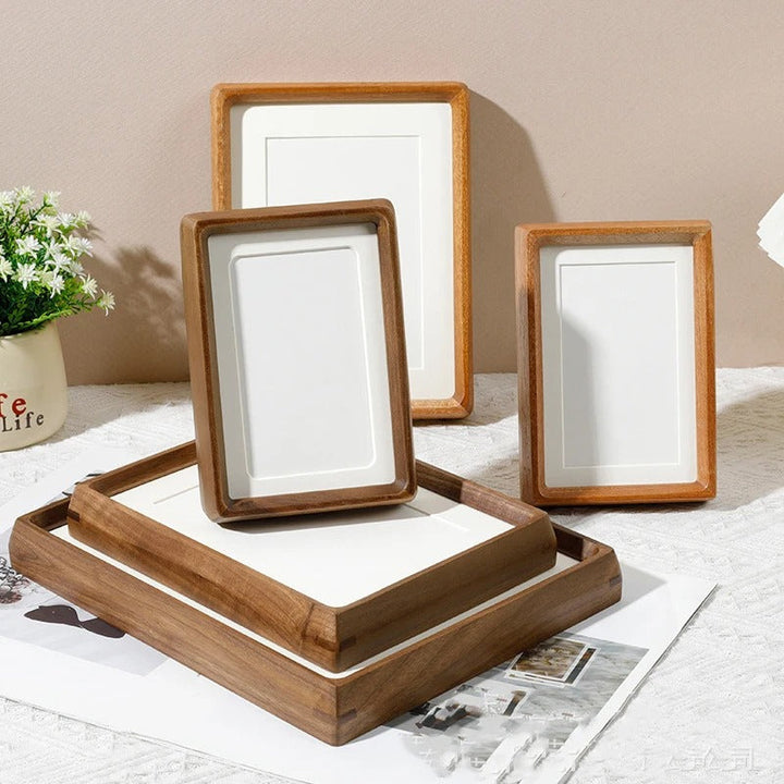 Scandinavian wooden photo frames in assorted sizes, perfect for stylish home or office wall display