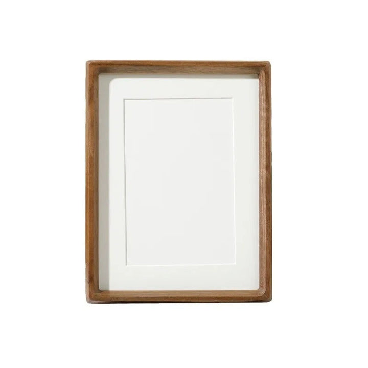 Compact wooden photo frame with white mount, crafted for refined home or office décor styling