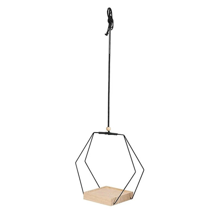 Nordic geometric hanging shelf with black iron frame and light wood platform, minimalist design perfect for small indoor plants.