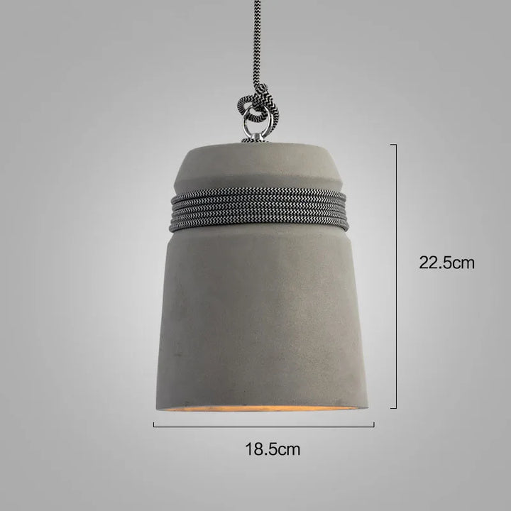 Concrete pendant light with measurements on a gray background