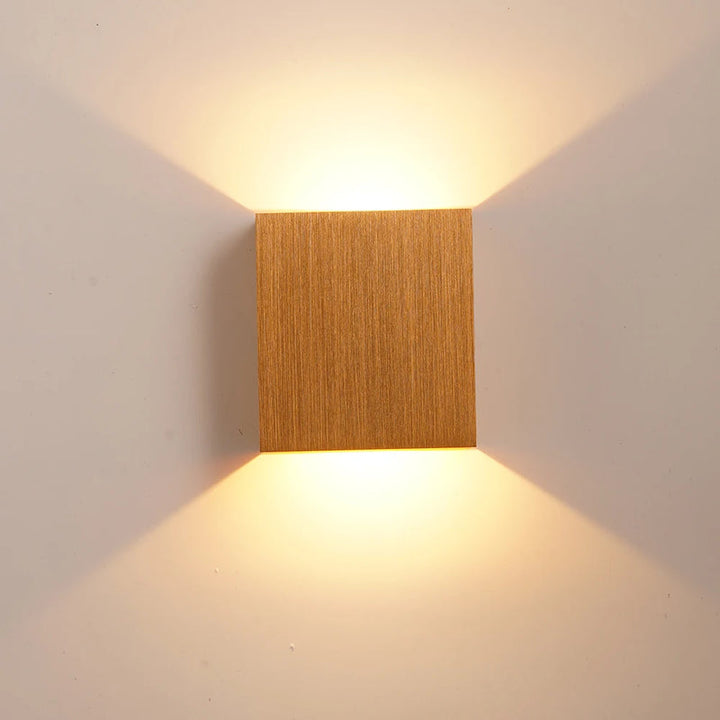 KUBE brushed gold aluminium LED wall lamp with warm white up and down indoor wall lighting