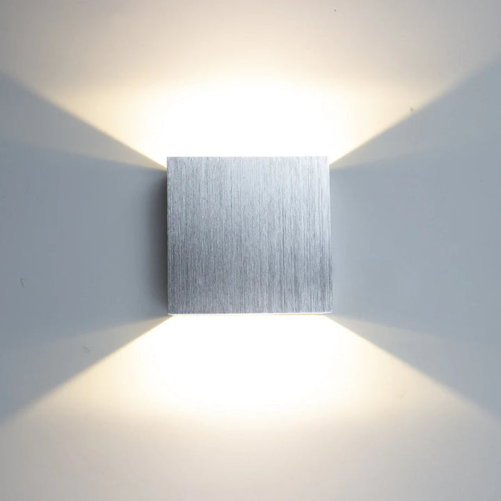 KUBE brushed silver aluminium LED wall lamp with cool white Nordic style up and down light