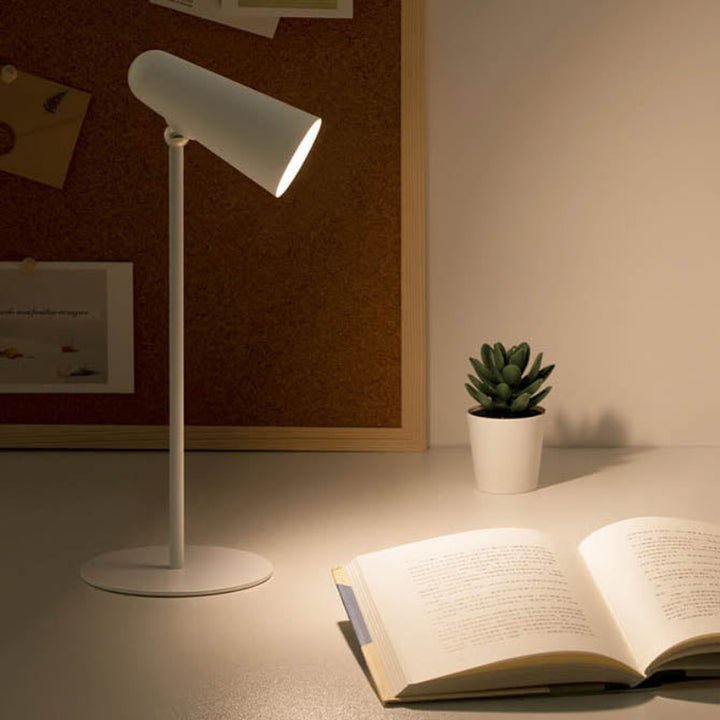 Cordless LED reading lamp on desk, ideal for bedtime stories or soft ambient lighting